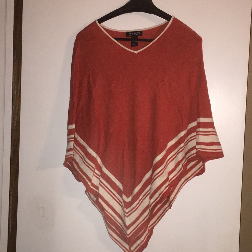 Orange and white poncho